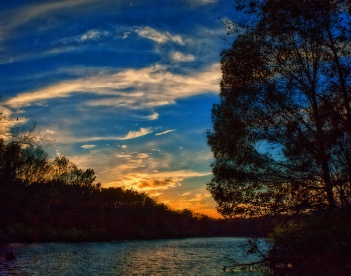 Autumn Sundown on a Prairie River